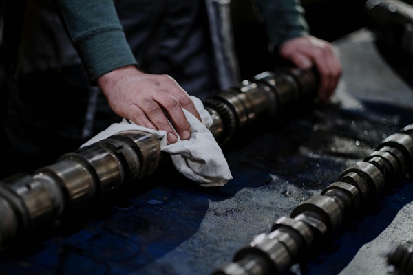 Person working on machine parts